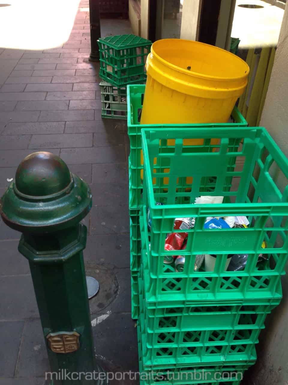 Green crates in the rubbish