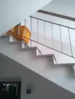 Riding a crate down the stairs