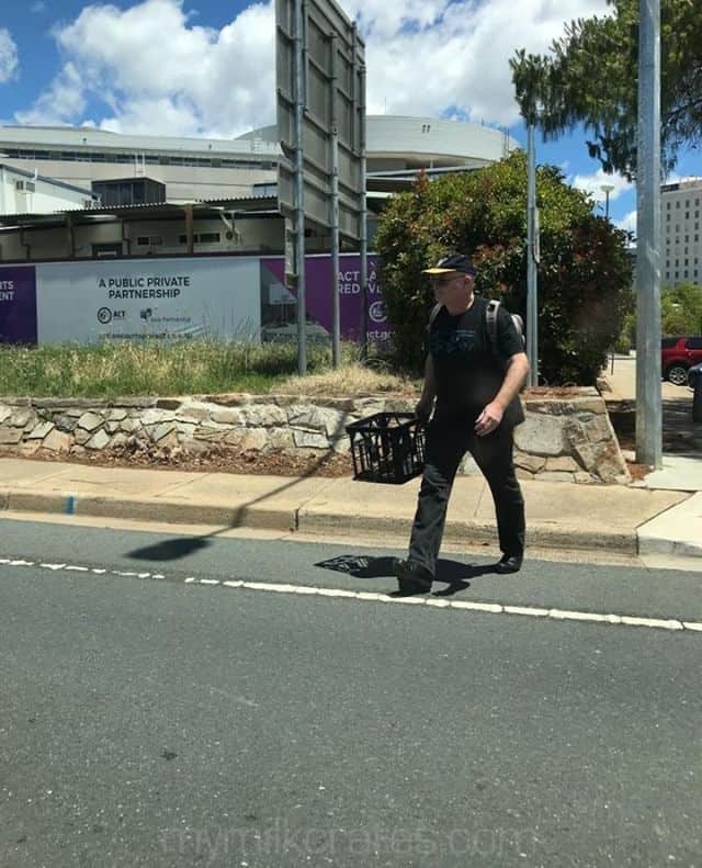 Taking his crate for a walk